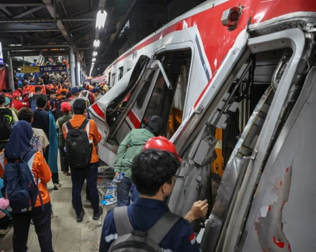Rescuers race to free survivors trapped inside train after fatal crash in Indonesia