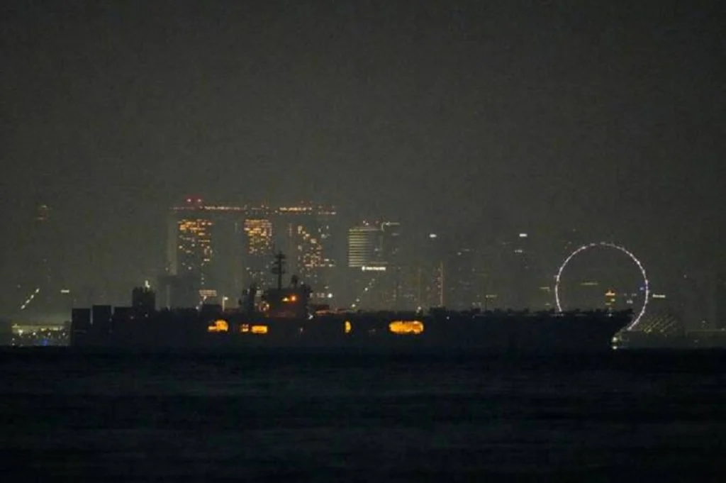 USS Abraham Lincoln sails past Singapore on its way home