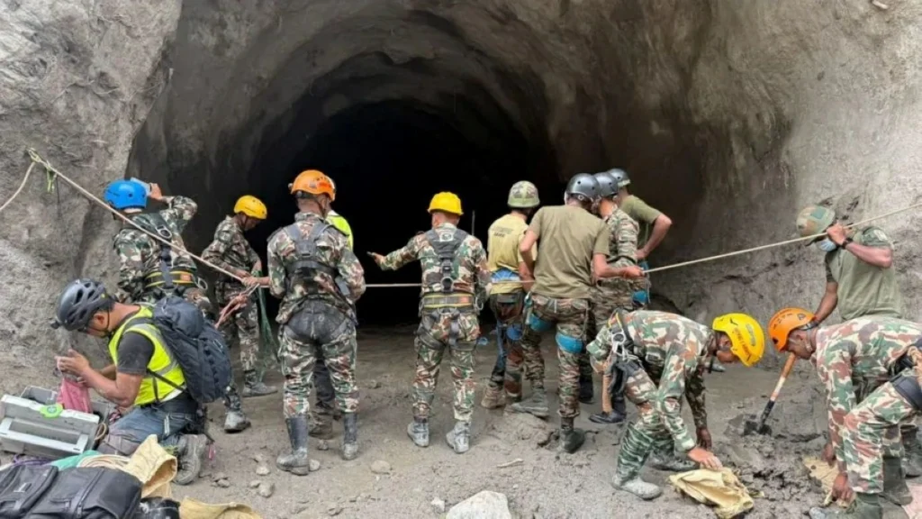 Nepal rescuers blast hillside in search of hydropower workers trapped in tunnels